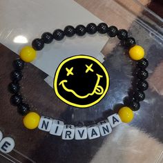 Punk Bracelets Aesthetic, Metallica Bracelet, Matching Kandi Bracelet Ideas, Emo Bracelet Ideas, Kandi Ideas Words, Nirvana Bracelet, Kandi Singles Ideas, Scene Bracelets, Pulseras Ideas