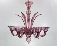 a pink chandelier hanging from the ceiling