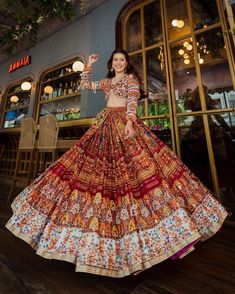 PRESENTING NEW DESIGNER PRINTED LAHENGA CHOLI Featuring printed lehenga choli in heavy Butter silk . Quality is worth paying👌 # FABRIC DETAILS # LEHENGA :  HEAVY BUTTER SILK WITH *REAL MIRROR WORK *   &. * 4 MTR FLAIR  FULLY STITCH)*   # INNER : SILK # CHOLI         :  SOFT BUTTER SILK & *REAL MIRROR WORK*  (1.20 MTR FABRIC) # DUPATTA   :  HEAVY BUTTER SILK WITH * REAL MIRROR WORK*  # FREE SIZE FULLY STITCHED  LAHENGA WITH UN STITCH 1.20 MTR BLOUSE ; LAHENGA LENGTH IS 44 INCHES ;   (*weight: 1 Bridal Garba Chaniya Choli, Gujarati Chaniya Choli Designs, Garba Bridal Outfit, Bride Garba Outfit, Navratri Ghaghra Design, Garba Ghagra Choli, Traditional Garba Outfit, Gujarati Dress Style, Gujrati Ghagra