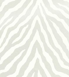 an animal print wallpaper with white and grey stripes on the side, as well as a zebra stripe pattern