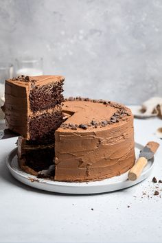 a chocolate cake with one slice cut out