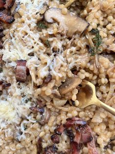 a close up of food with mushrooms and pasta