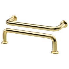 two gold metal handles on a white background