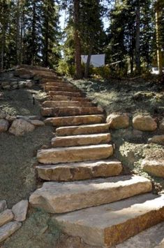 stone steps leading up to the top of a hill