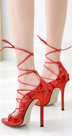 Party Lace-up Strappy Sandals, Trendy Strappy Lace-up Sandals For Parties, Party Lace-up Sandals With Straps, Party Lace-up Strapped Sandals, Lace-up Strappy Sandals For Party, Lace-up Strappy Evening Heels, Lace-up Strappy Heels, High Heel Lace-up Sandals For Party, Party Sandals With Red Sole And Fitted Design