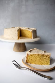 a piece of cake sitting on top of a plate next to a knife and fork