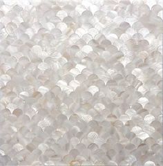 a close up view of the surface of a sheet of white plastic bubble wrapper