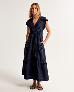 Flattering short-sleeve maxi dress in our classic poplin fabric and relaxed-fit silhouette, featuring functional tie-waist detail, button-through detail, v-neckline and a tiered skirt. Female Features, Tie Waist Maxi Dress, Tie Maxi Dress, Women's Tie, Short Sleeve Maxi Dresses, Womens Tie, Maxi Dress With Sleeves, Tiered Skirt, Poplin Fabric