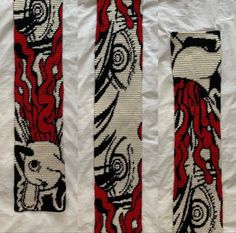 three pieces of cloth with designs on them, one is red and the other is white