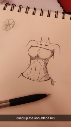 a pencil drawing of a woman's bra on top of a piece of paper