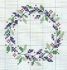 a cross stitch pattern with purple flowers and green leaves in the center on a white background