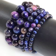 a close up of a bracelet with beads on it