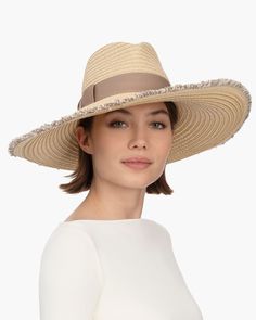 When shopping for a special occasion hat for sale online, Caroline, an elegant wide-brim fedora, will make an impression. It is suitable to wear for a wedding, Kentucky Derby, or an outdoor luncheon. This ever-chic style is made entirely of Squishee®, our unique man-made material, resembling natural raffia, which incorporates recycled fibers. The profile brim is wired beneath the narrow self-fringed edge, sweeping up on one side and gently sloping down on the other, to dramatic effect. A cotton Caroline White, Special Occasion Hats, Cute Summer Outfit, Cotton Ribbon, Wide Brim Fedora, Cute Summer Outfits, Hats For Sale, Kentucky Derby, Fedora Hat