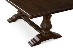 a large wooden table with two legs and a square top on an isolated white background