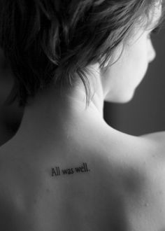 the back of a woman's shoulder that says, all was well