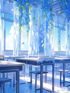 a room filled with lots of tables and chairs next to tall windows covered in blue flowers