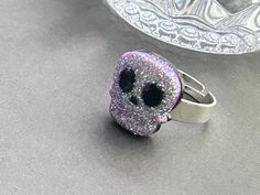 Looking for scary jewelry to wear during the Halloween holiday or any time of year?  The gothic skull charm adheres onto an adjustable silver plated ring.  The skull charm is about 15x 15mm. Fits most sizes. ♥ See more Halloween jewelry here: https://www.etsy.com/shop/iceblues/items?ref=listing-shop-header-item-count&search_query=halloween GIFTS Each item is individually wrapped in a branded jewelry gift box. We do not include price receipts in the package. We are happy to ship directly to the recipient. EXPEDITED SHIPPING At checkout, you have the option to choose faster shipping in the drop-down menu. Ship times do NOT include production times. However, if you select expedited shipping, we will try to get your order completed faster. SHOP FAQs Please read my shop policies for my current Scary Jewelry, Halloween Skulls, Halloween Ring, Gothic Skull, Halloween Jewelry, Skull Ring, Plated Ring, Halloween Skull, Ring For Women