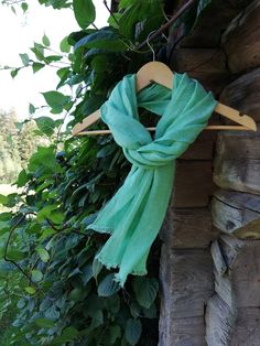 "Warm emerald green, gauzy linen scarf with fringes. Soft and airy made from 100% pure linen. Adorable wrinkle. Edges are frayed for more casual look and fixed to prevent further fraying. Dimensions: approximately 19\" wide x 76\" long [48 x 193 cm] Care instructions: - gentle wash cycle - preferably lukewarm water - straighten and hang to dry - It will become softer with every wash. Note that colours may look different on your display depending on their settings and technical characteristics. I Boho Scarf, Linen Scarf, Striped Table Runner, Handmade Table Runner, Boho Scarfs, Linen Scarves, European Linens, Look Plus, Striped Linen