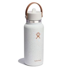 the hydro flask water bottle is white and has a wooden handle on it's side