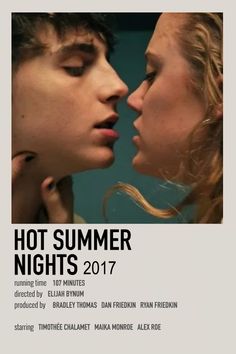 a couple kissing each other in front of a poster for the movie hot summer nights