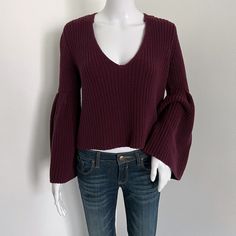 Free PeopleUS Women's Size XSBurgundy merlot red bell sleeve sweater that is a bit cropped with bell sleeves. The color is faded as it is 100% cotton. Please see pictures for details. Shoulder | 14 inches seam to seam straight across back of the sweaterSleeve | 22 inches center back of the sweater to the end of the cuffLength | 19.5 inches center base of the back of the collar to the end of the sweaterChest Circumference | 15 inches x 2 = 30Please note that color may vary a small amount because of my lighting. If you have questions please ask and I would be happy to help! -Michelle Knit Bell Sleeve, Bell Sleeve Sweater, To The End, Merlot, Sweater Sleeves, Bell Sleeve, Sleeve Sweater, Sweater Sizes, Bell Sleeves