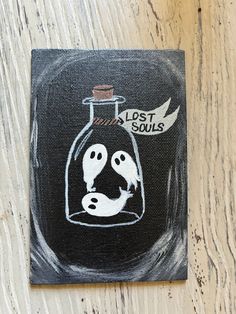 a painting of two ghost in a glass bottle with the caption lost soul's