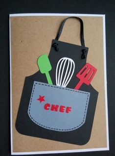 a paper bag with the word chef in it and some kitchen utensils inside