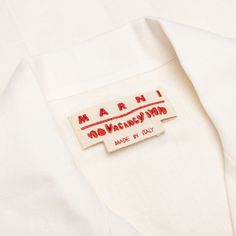 there is a label on the back of a white shirt that says march 1 memory month