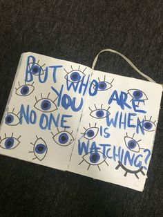 two notebooks with blue writing on them that say, but who are you when no one is watching?