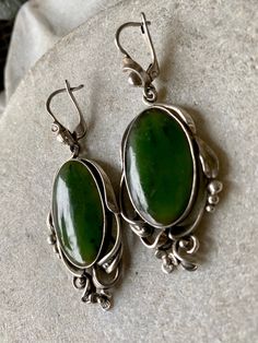 Beautiful Arts n Crafts Art Nouveau Sterling Silver Jade Vintage Antique Earrings See pictures next to ruler for scale See link below for matching ring Unique Round Earrings With Polished Finish, Traditional Polished Earrings As Gift, Traditional Polished Earrings For Gift, Unique Polished Drop Earrings, Antique Green Jewelry With Polished Finish, Antique Oval Handmade Earrings, Handmade Oval Antique Earrings, Artisan Teardrop Jewelry For Formal Occasions, Artisan Dangle Jewelry For Formal Occasions