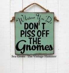 a sign that says, whatever you do don't piss off the gnomes