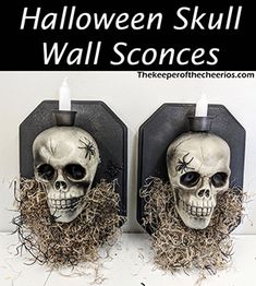 two halloween skull wall sconces with text overlay that reads diy halloween skull wall scones