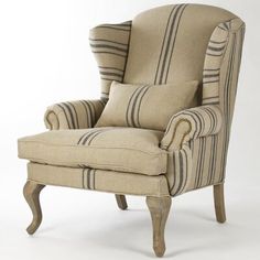 an upholstered chair with striped fabric on the back and arms, sitting against a white background