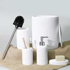 the bathroom accessories are neatly organized and ready to be used in the home or office