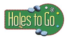 holes to go sign with golf balls on it