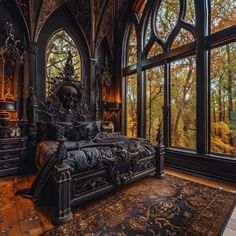 a gothic bedroom with an ornate bed and large windows looking out onto the trees outside