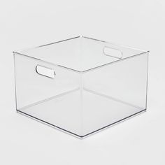 a clear plastic box with handles on the side