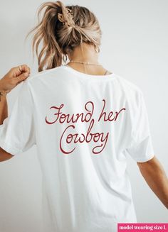 Celebrate your love story with our adorable "Found Her Cowboy" graphic tee. Perfect for brides-to-be, this comfy and stylish shirt features a charming design that captures the essence of your special day. Pair it with jeans or a skirt for a cute and casual look. Cowboy Graphic, Pilates Socks, Bachelorette Ideas, Cowboy Shirt, Cowboys Shirt, Stylish Shirt, Trending Now, Stylish Shirts, Bridal Accessories