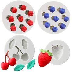 four different shapes and sizes of fruit molds on white plates with cherries, strawberries, and blueberries