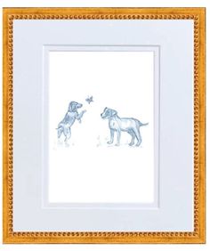 two dogs playing with a butterfly in a gold and white framed art print on paper