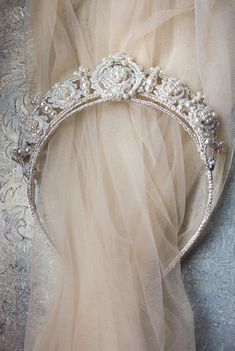 The Primrose Tiara is a pearl statement wedding headpiece with heirloom-quality handcrafted lace detailing and freshwater pearls. Bridal Pearl Tiara, Regency Headpiece, Pearl Wedding Crown, Wedding Headpiece Tiara, Veil With Tiara, Antique Wedding Veil, Crown And Veil, Bridal Halo Headpiece, Tiara Veil