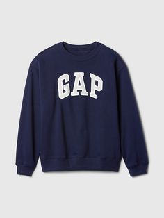 Soft, comfy fleece. Dropped shoulder, long sleeves with banded cuffs. Crewneck. Gap logo at front (select styles have eyelet logo). Banded hem. #591900 Gap Crewneck, Cute Crewneck Sweatshirt, Athletic Logo, Gap Outfits, Cute Crewneck, Gap Sweatshirt, Thrift Inspo, School Sweatshirts