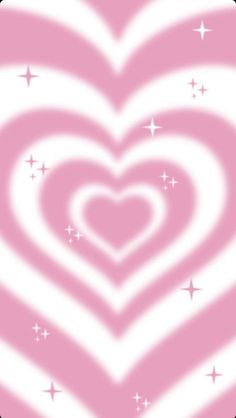 a pink and white heart with stars on it