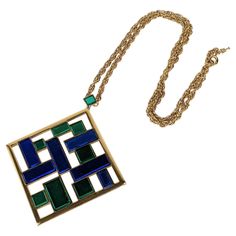 Trifari Mirrored Tile Modernist Pendant with deep blue and emerald mirrors. Modernist style with gilt chain. 3.5" x 3" pendant. Chain measures 23". 1960's USA. Matching brooch and earrings available. Mirrored Tile, Deep Blue, Jewelry Necklace Pendant, Emerald, Jewelry Necklaces, Pendant Necklace, Mirror, Chain, Pendant