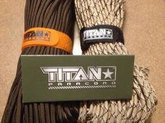 there is a tag that says titan paracord next to some ropes on the floor