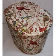 a box with birds and berries on it