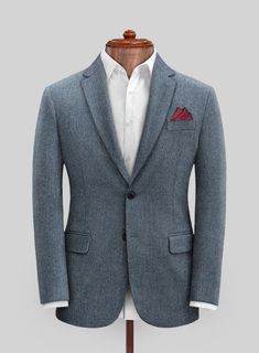 Both classic and versatile, our Vintage Herringbone Blue Tweed jacket is surely going to take you through the seasons with stylish ease. Crafted from wool, this tweed jacket is rich in quality and lends a distinctly bespoke edge which makes it a suave choice. Wear it with a matching waistcoat and trousers, a crisp white shirt and black shoes. 
 
Look Includes   Vintage Herringbone Blue Tweed Fabric  Two Button Jacket Style  Notch Lapel   Horn Royal Black  Buttons  Single Vent  Two cuff buttons Blue Tweed Jacket, Grey Tweed Suit, Herringbone Tweed Jacket, White Linen Suit, Green Velvet Jacket, Peaky Blinders Suit, Country Gentleman, Custom Dress Shirts, Brown Derby