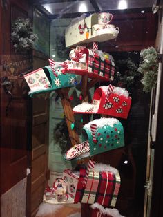 a display case filled with lots of christmas presents