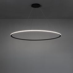 a circular light fixture hanging from the ceiling