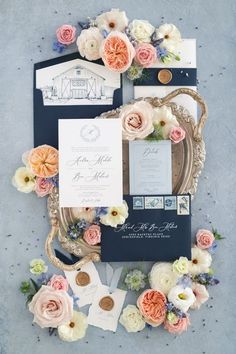 the wedding stationery was done in navy blue, peach and white with an assortment of flowers